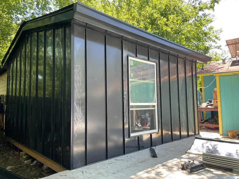 Black standing seam metal wall panels for Roof Inspection in Kenwood