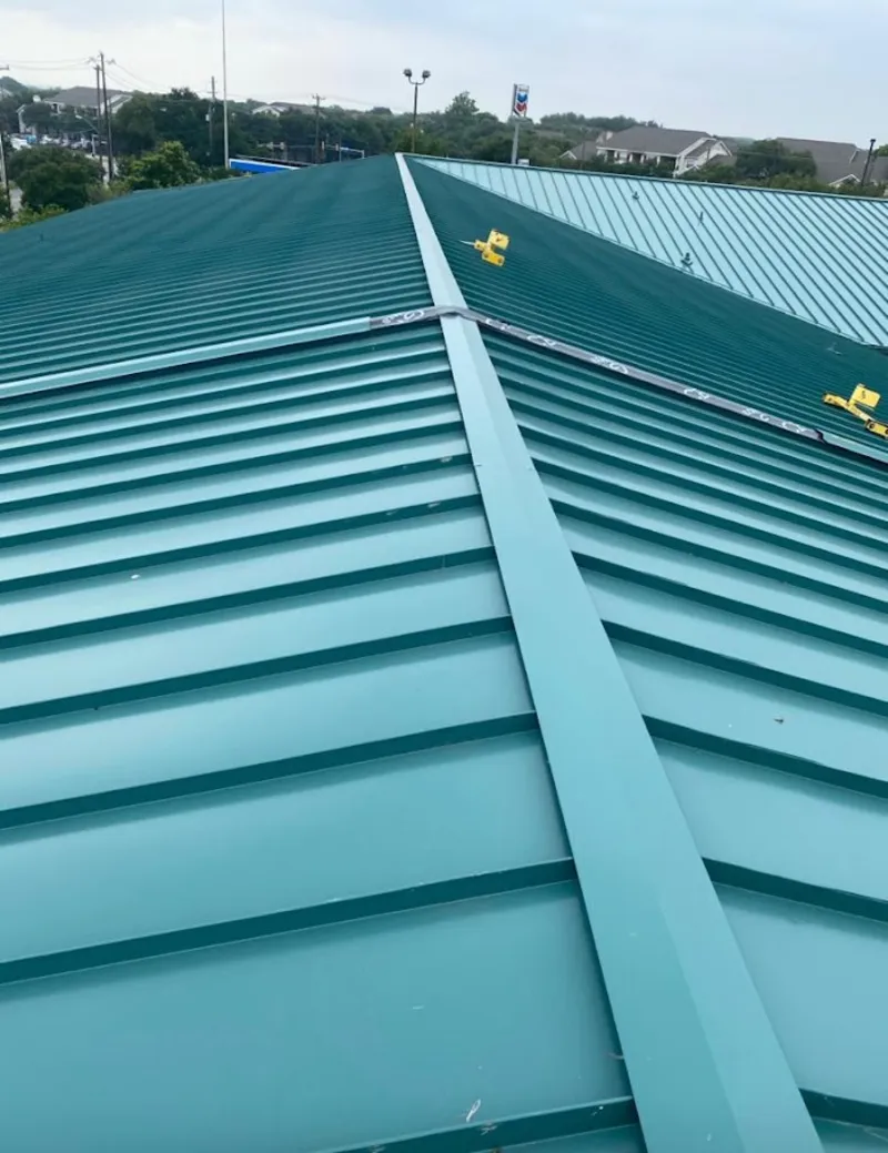 Green commercial metal roof ridge and valley for Metal Roof Repair in Kenwood